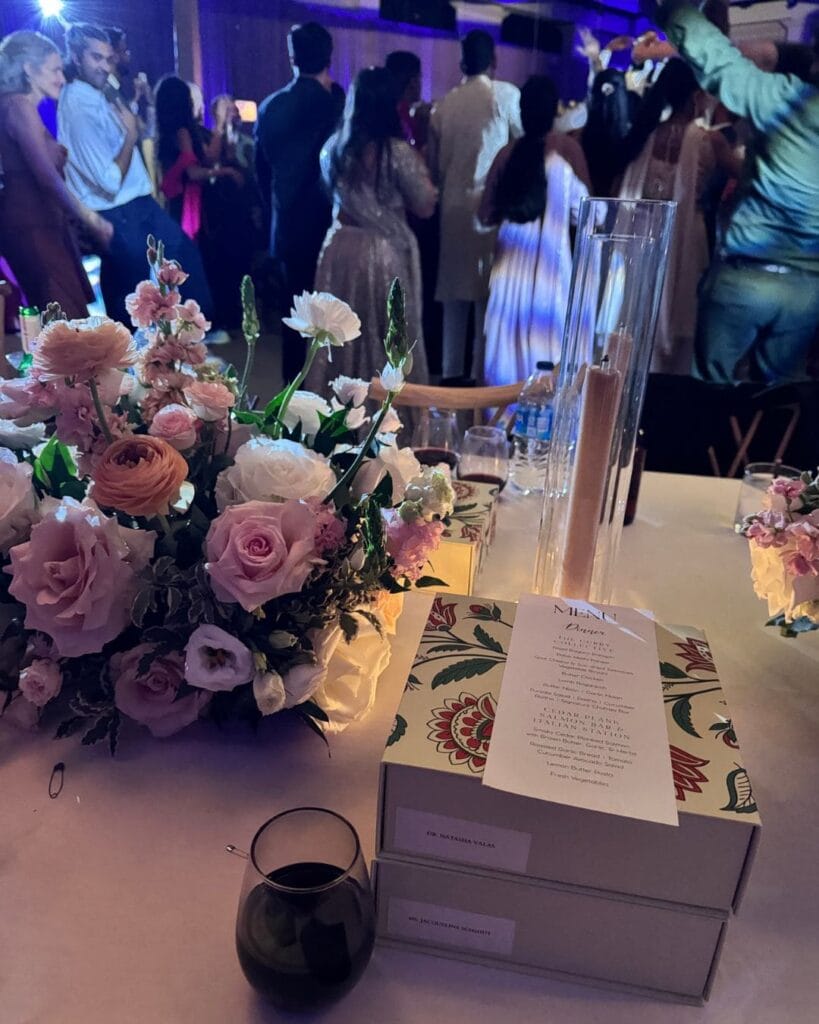 The reception in full swing behind the gift boxes