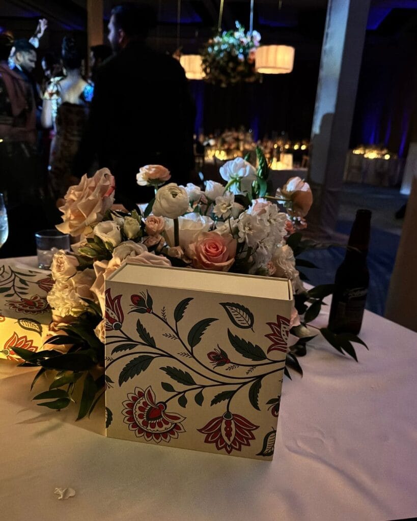 A box standing among the table flowers