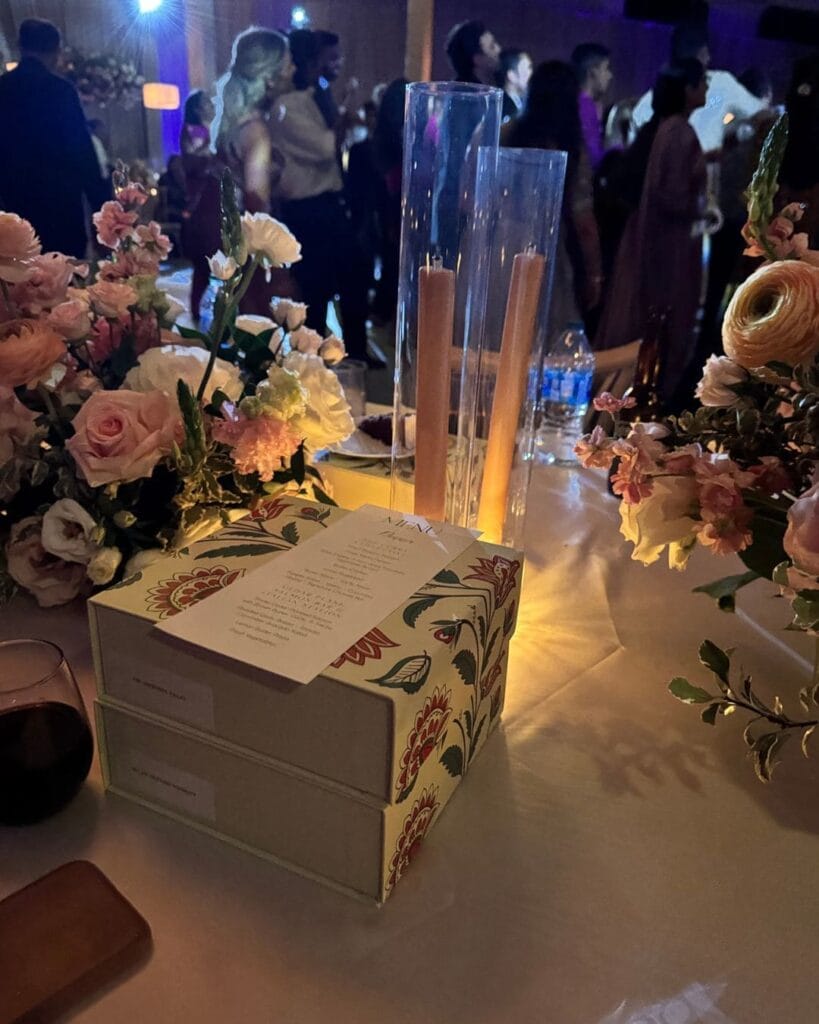 Boxes waiting at each place setting with the dinner menu